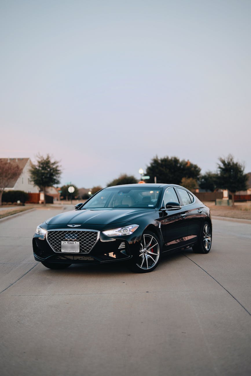 black sedan on road